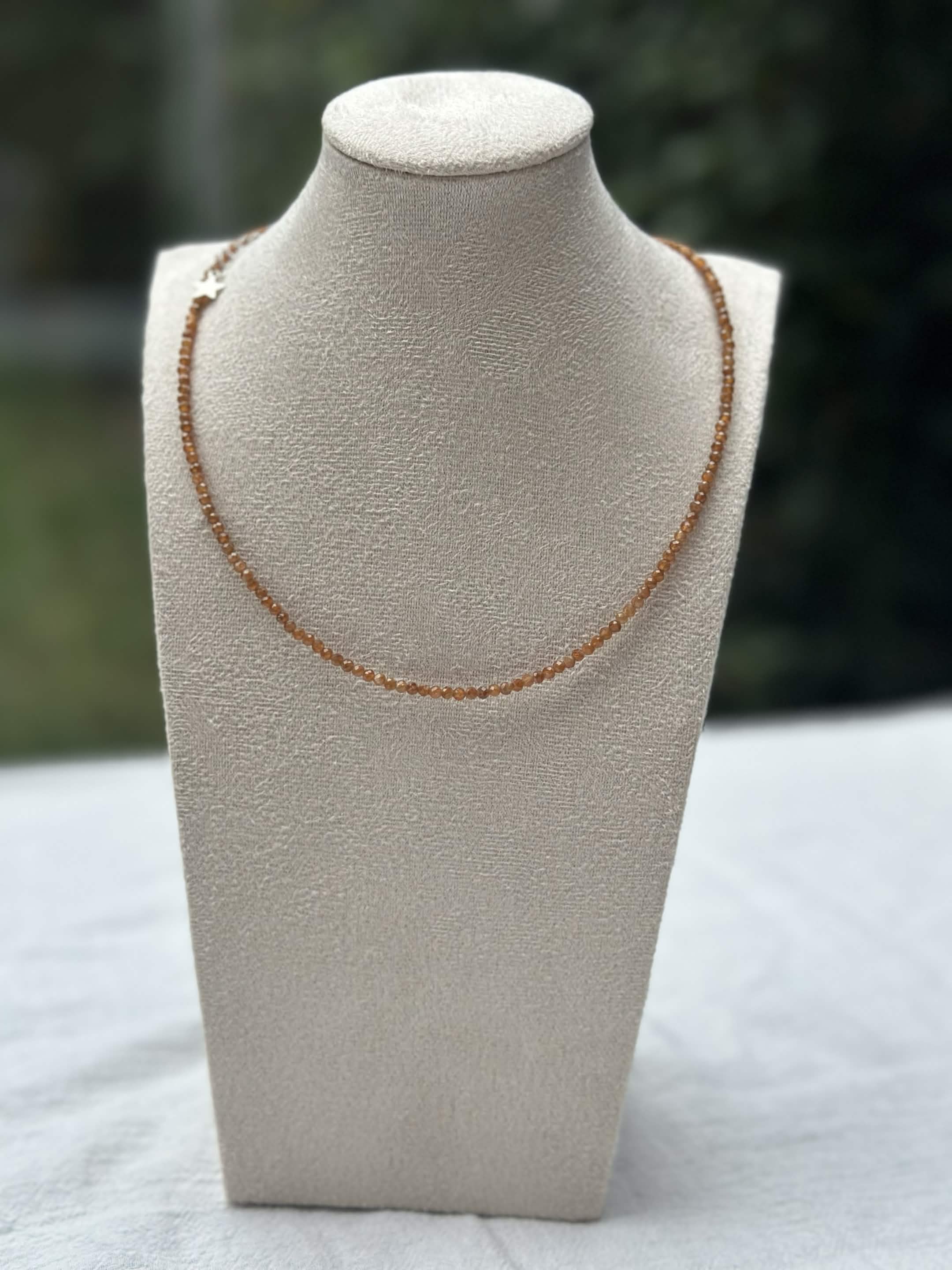 Golden faceted beaded necklace