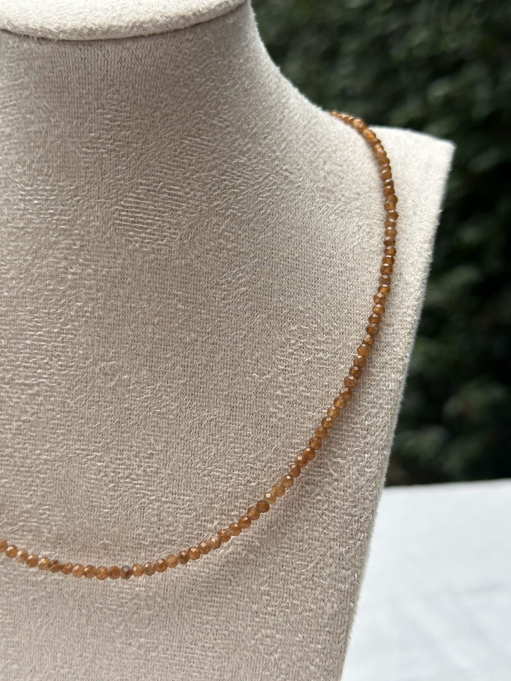 Close-up of golden faceted beads