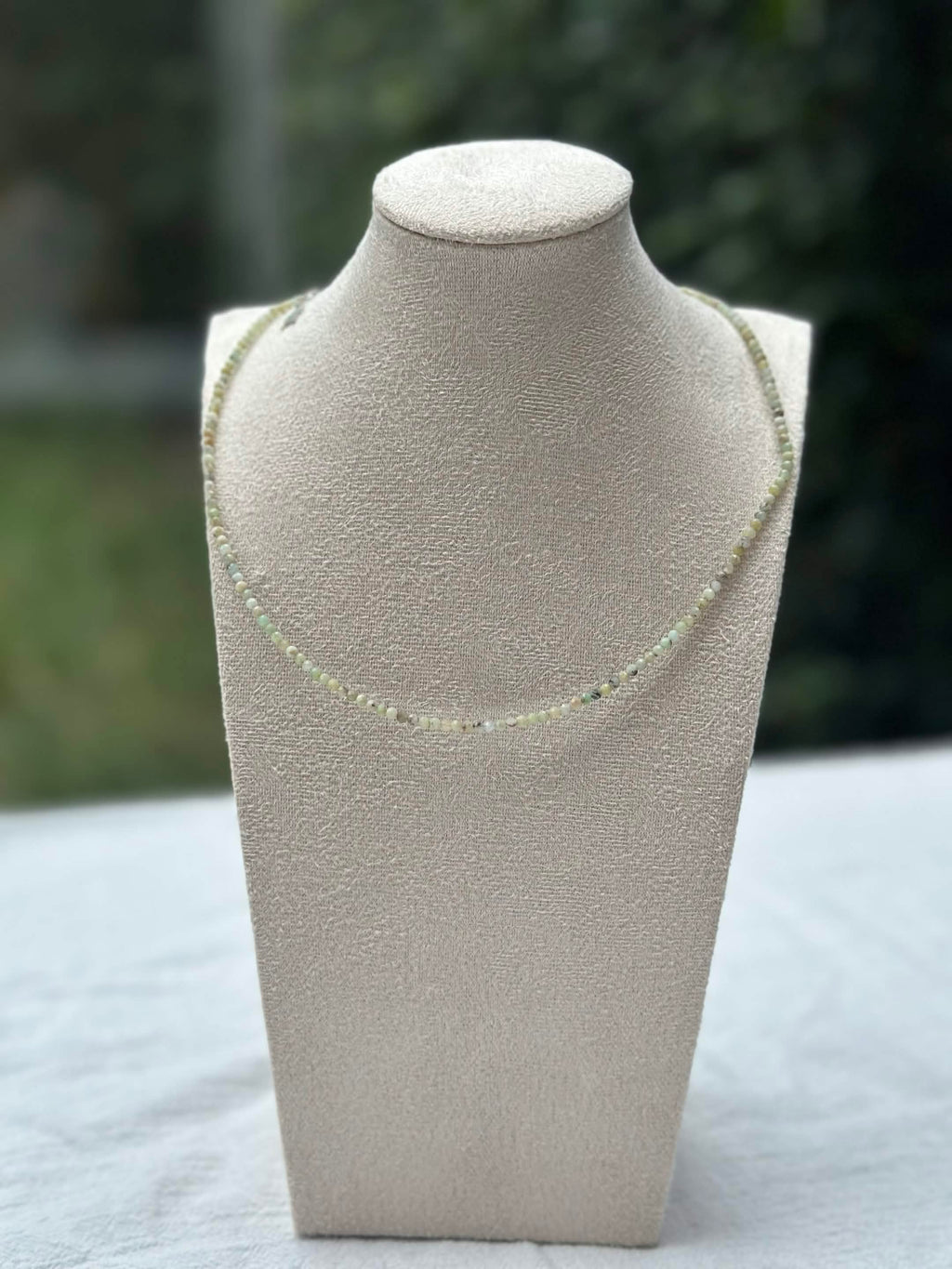 Pale green beaded necklace